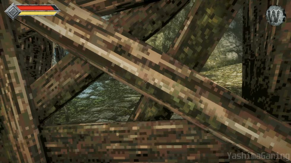 Crossed wooden planks blocking a narrow opening, with ground visible beyond