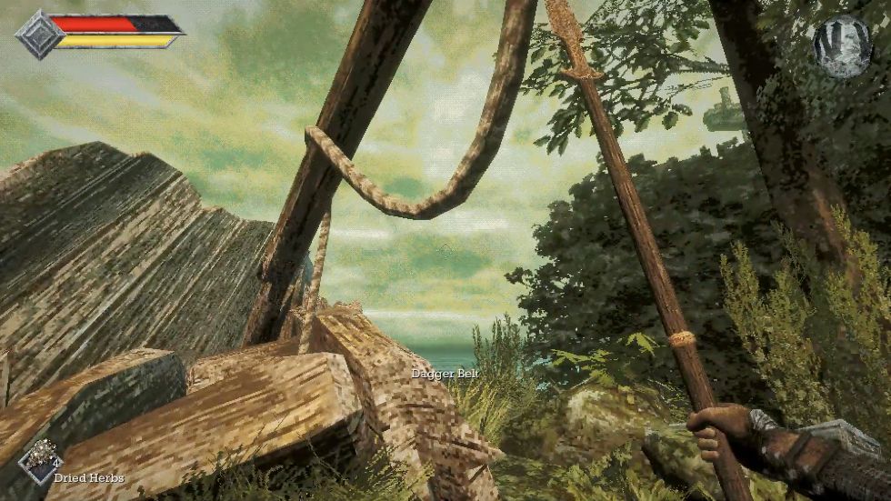 Dagger Belt interaction text beside broken timbers and a hanging rope on the island